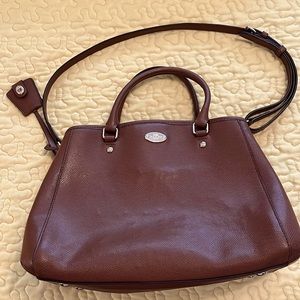 Coach brown satchel/crossbody. Minor ink marks.
